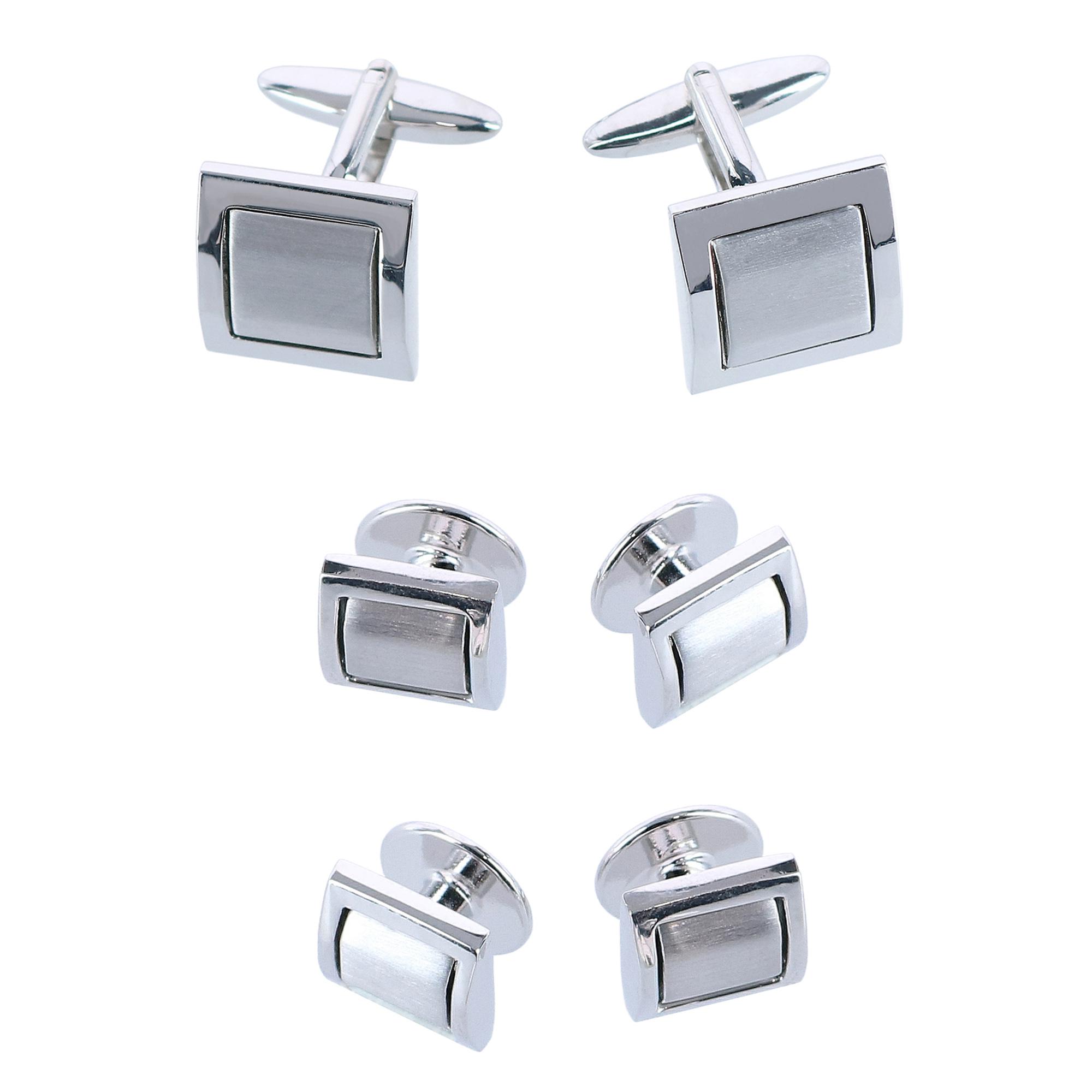 The Plaza Square Formal Set is a simple yet handsome set that will compliment any suit or tuxedo for all events, including weddings, board meetings, charity events, and holiday parties. This set is an impressive gift for that hard-to-buy gentleman in your life. Cufflinks measure three-fourths inch by three-fourths inch, and the tuxedo studs measure three-ninths inch by three-ninths inch. Made of rhodium over brass, this set is an easy match to elevate all your suits and tuxedo looks. Made of Rhodium Over Brass Formal set of 2 cufflinks and 4 tuxedo studs Square within square detailing Distinguished and classic Excellent gift idea for the hard to buy for gentleman Pairs perfectly with any suit or tuxedo